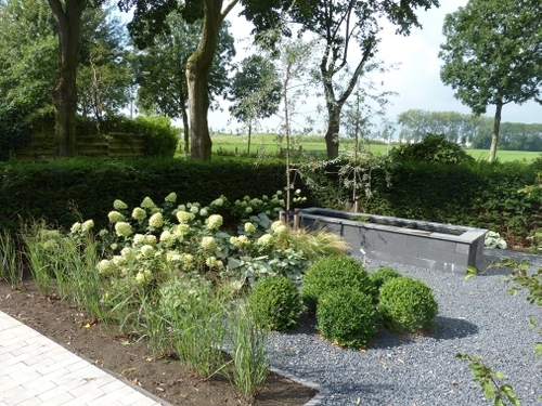 Door de breedte van de tuin kon aan alle wensen voldaan worden.
