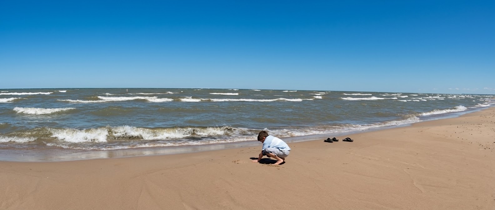 Chris playing on the beach, 2 August 2004
