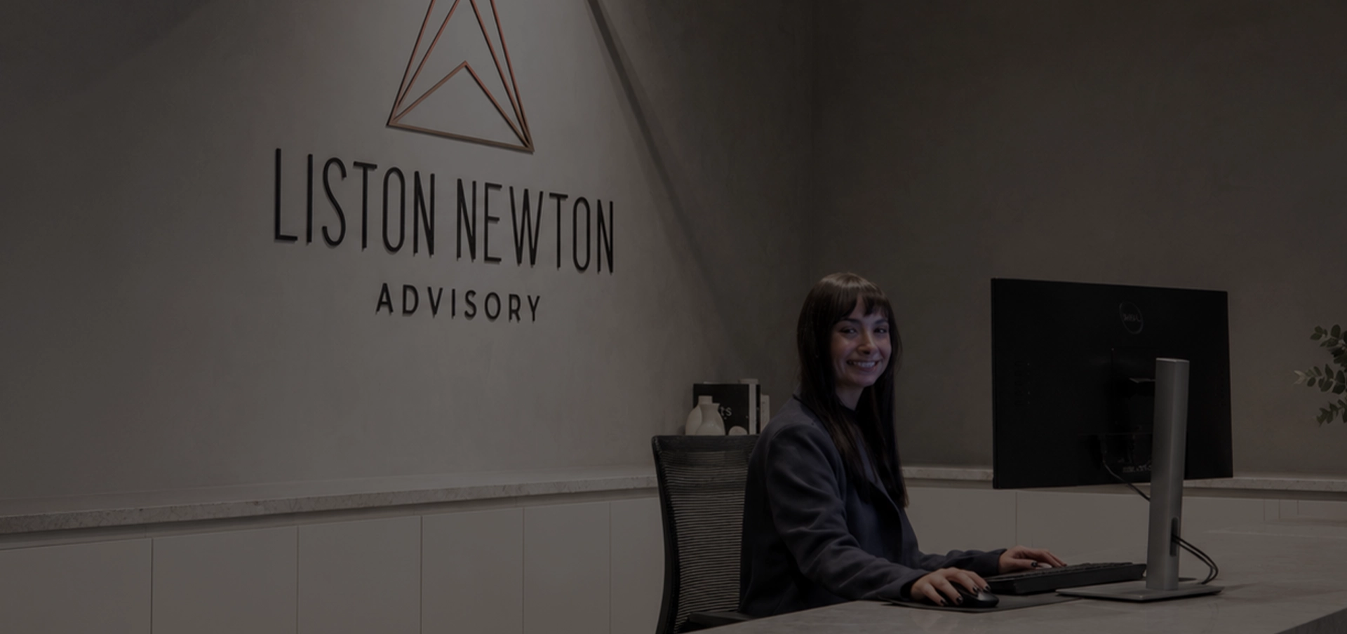 Professional working in the Liston Newton office, highlighting career opportunities and workplace culture.