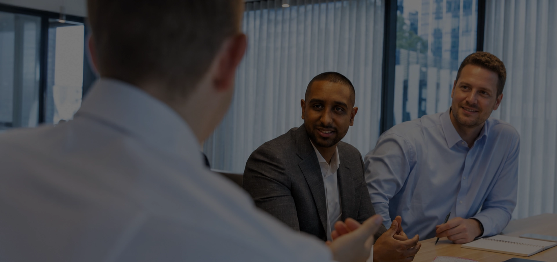 Liston Newton advisers conducting a financial strategy session with clients.