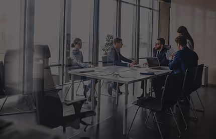 Team members in a meeting in an office