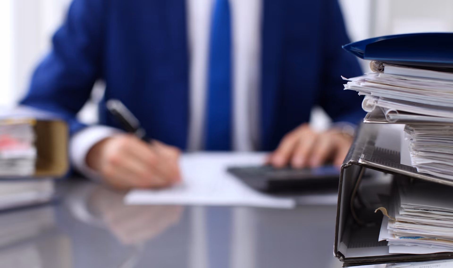 man completing tax planning