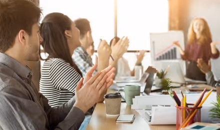 company celebrating an increase in profits