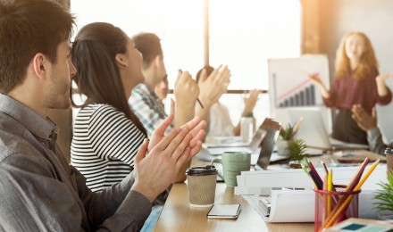 company celebrating an increase in profits