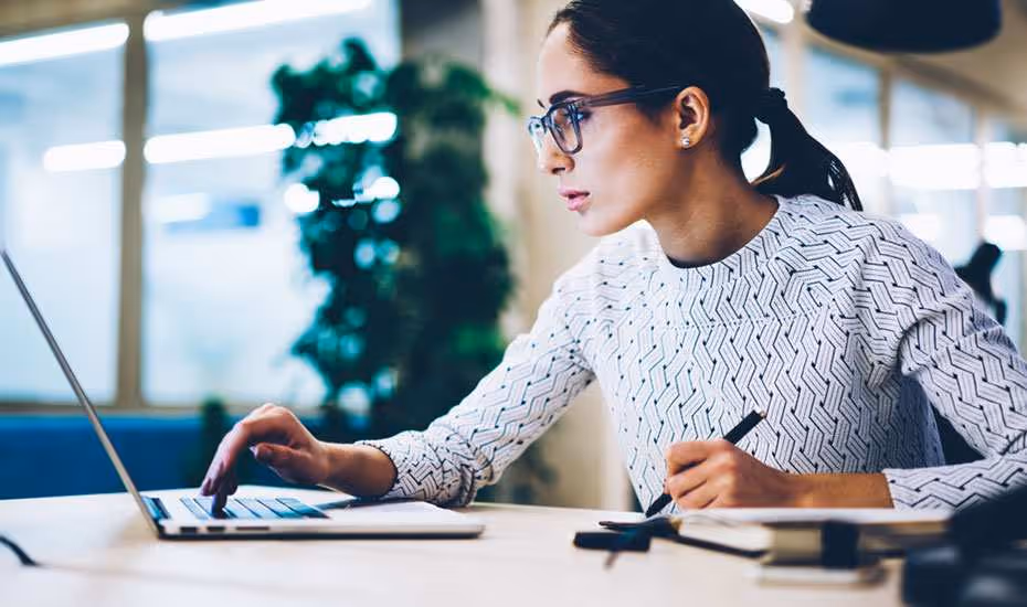 Woman determining the cost of SMSF accounting
