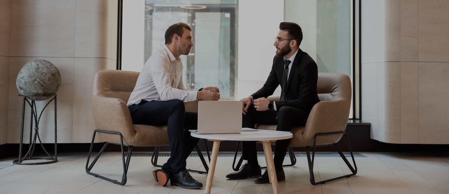 Two colleagues having a business meeting