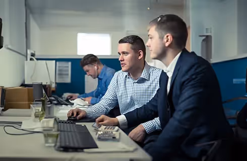 Staff analysing a business' tax information