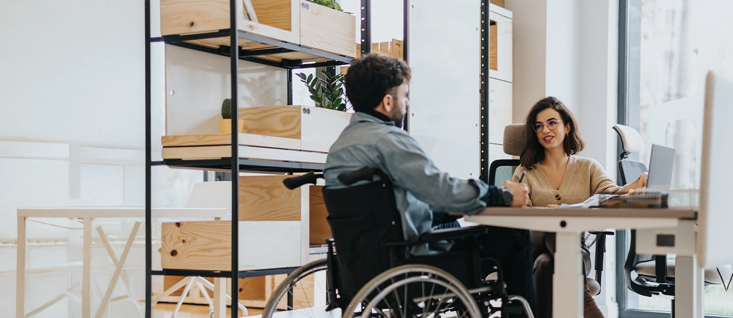 Disability support provider meeting with an NDIS participant to manage care services, funding, and administrative support.