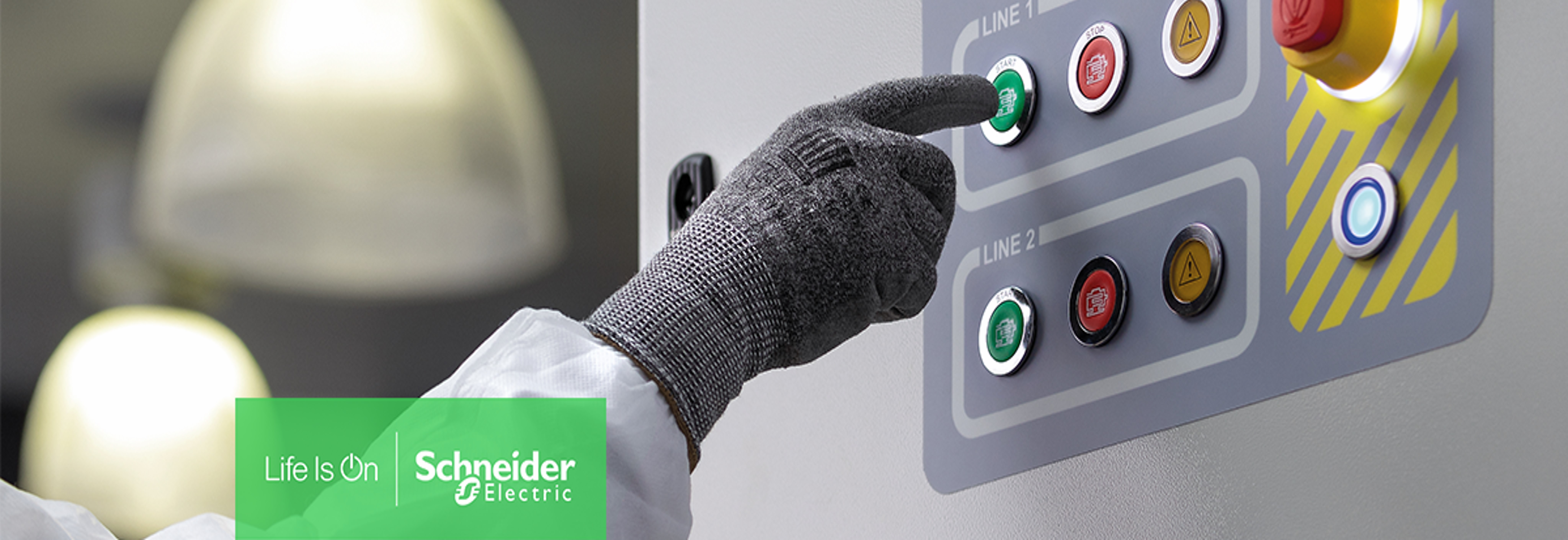 Image of a person about to push a button on a machine 