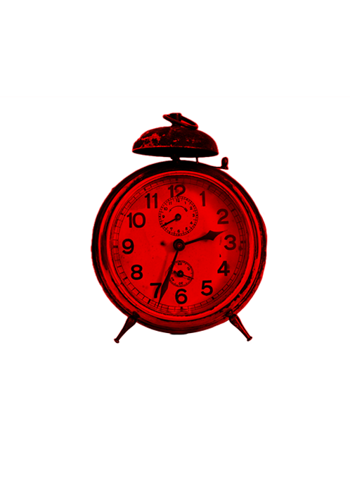 Old school looking red clock with bell on the top