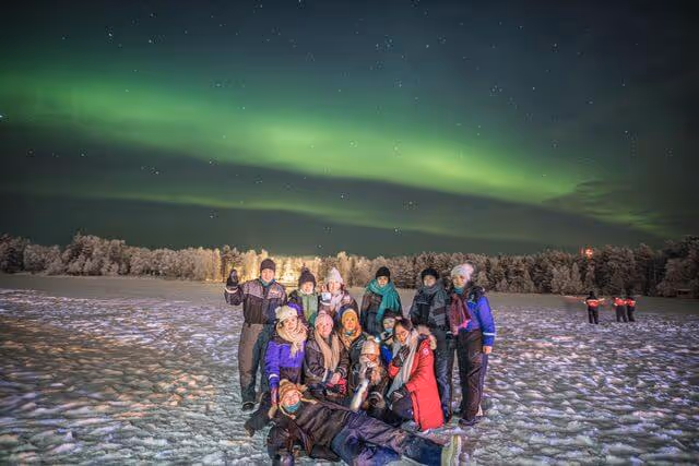 Unleash your inner explorer: Traverse Rovaniemi's snowy wilderness on a small-group adventure under the enchanting northern lights.