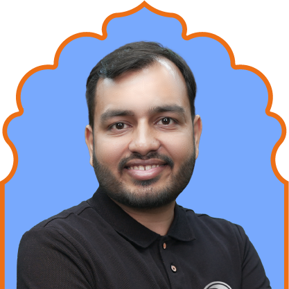 Smiling man with short dark hair and beard wearing a black collared shirt against a blue background with an orange border.