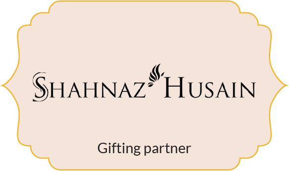 Shahnaz Husain logo with the text 'Gifting partner' below it on a scalloped beige background.