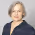 Yellow background with image of Susi Miller and webinar info on June 13 2023 at 11 am ET