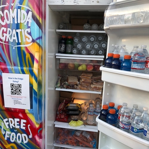 Visiting a community fridge for observational research.