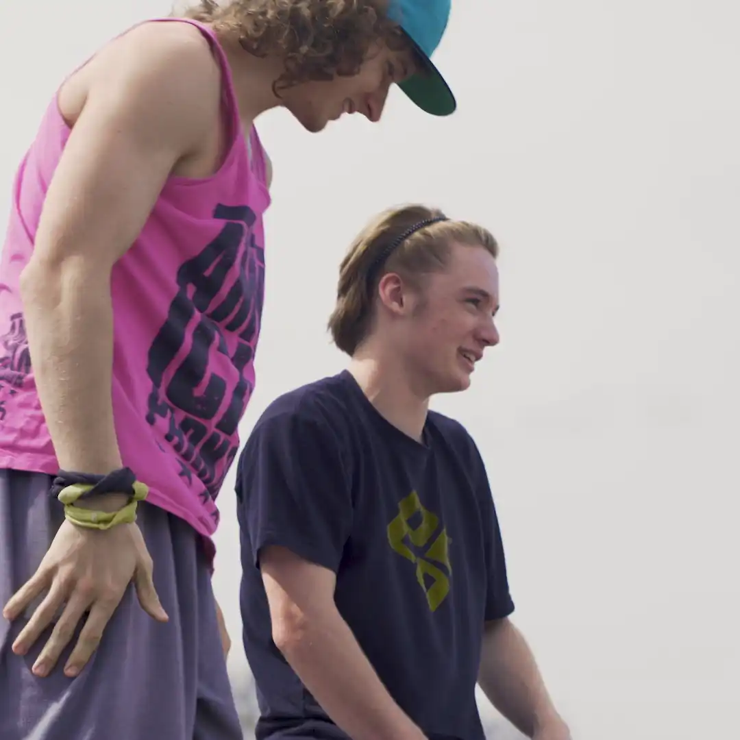 Candid Portrait of athletes against a blank sky