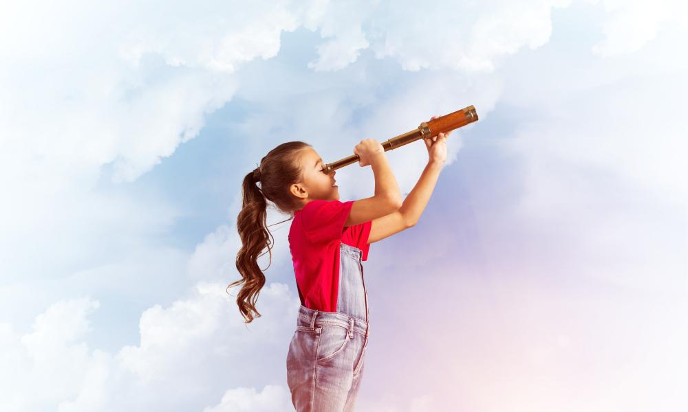 A child looking through a telescopeAI-generated content may be incorrect.