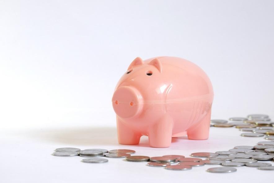 A piggy bank with coinsAI-generated content may be incorrect.