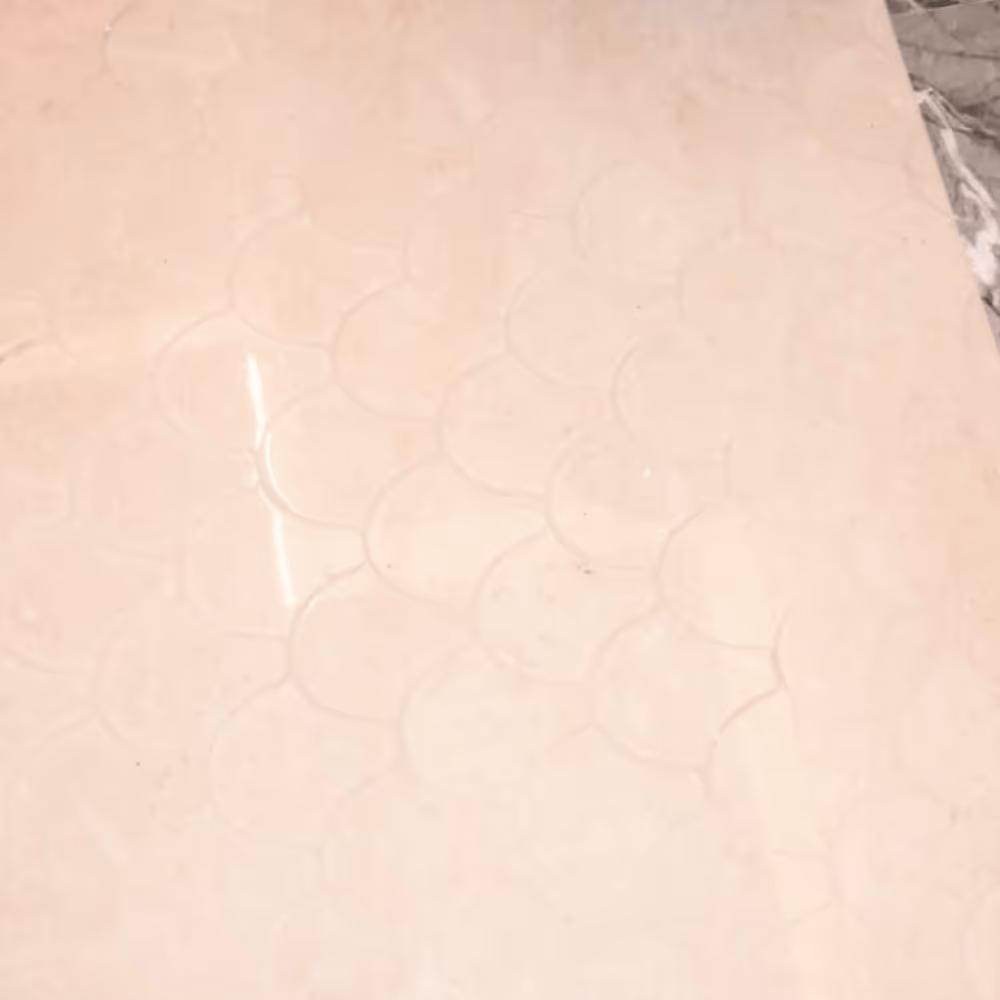 Photo d'un sol en marbre à motif rénové comme au premier jour avec des joints blanchis