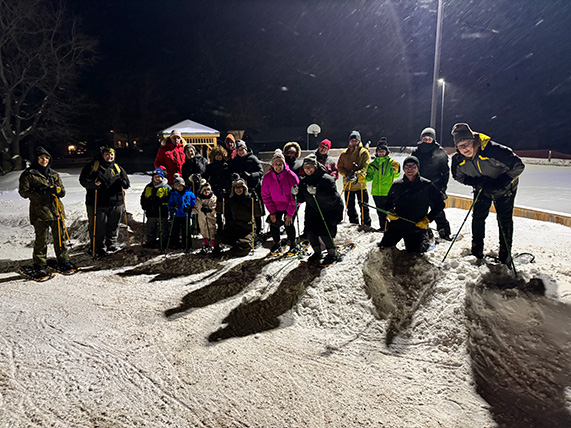 Group photo of attendees at Town of Mono's Family Moonlight Snowshoe held on January 22, 2026