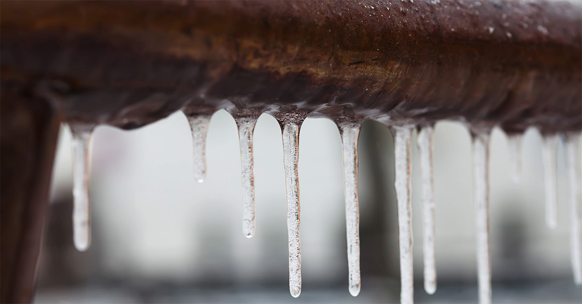 Pipe with frozen water on exterior