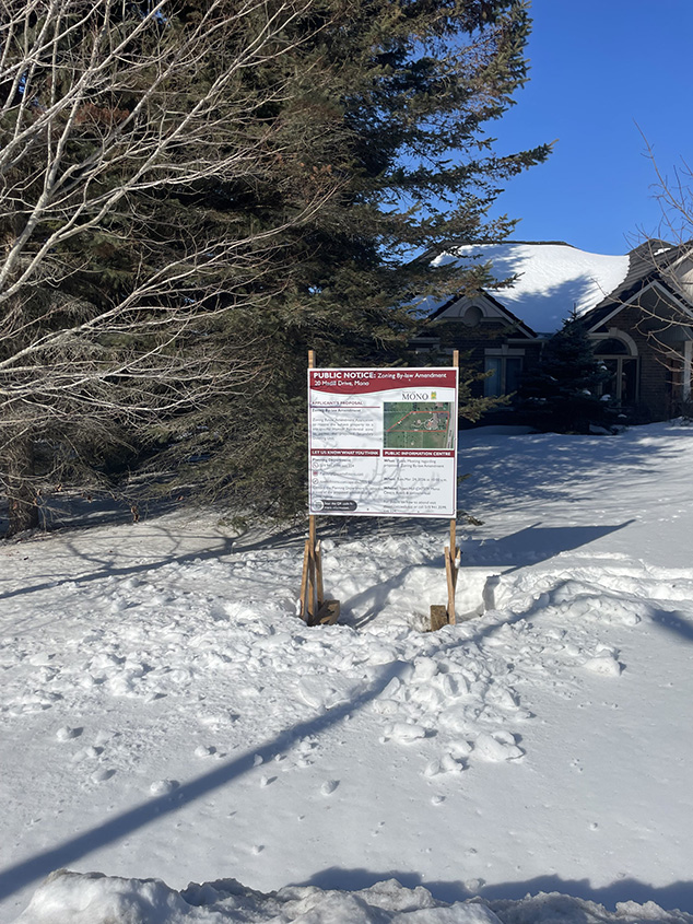Signboard with the Public Notice for the Zoning Bylaw on 20 Madill Drive