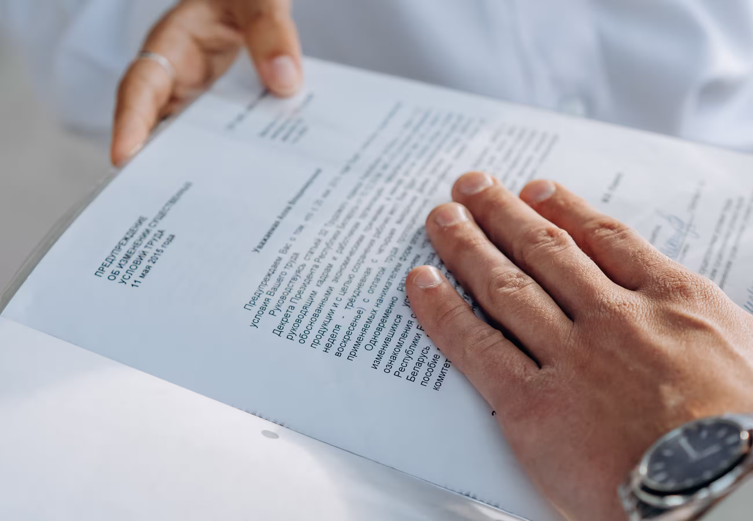 Person reviewing legal documents