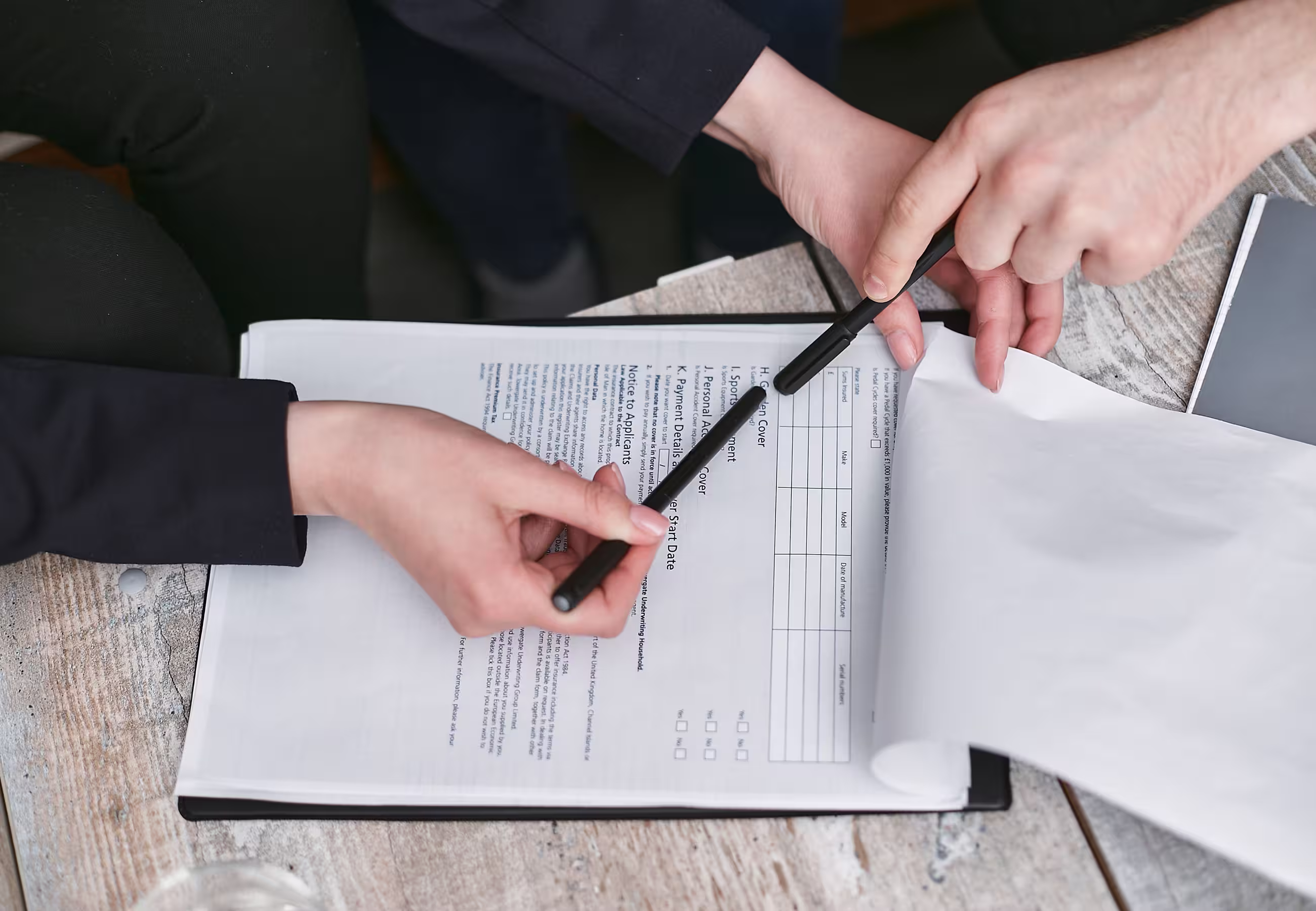 Professionals reviewing documents together