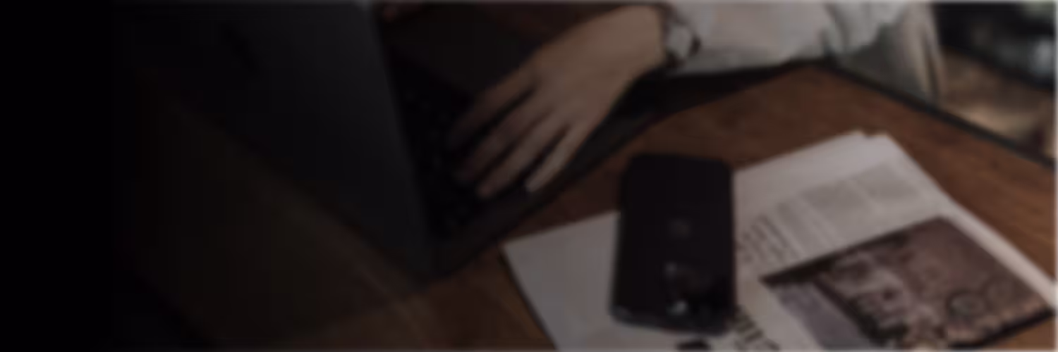Documents and laptop on a desk