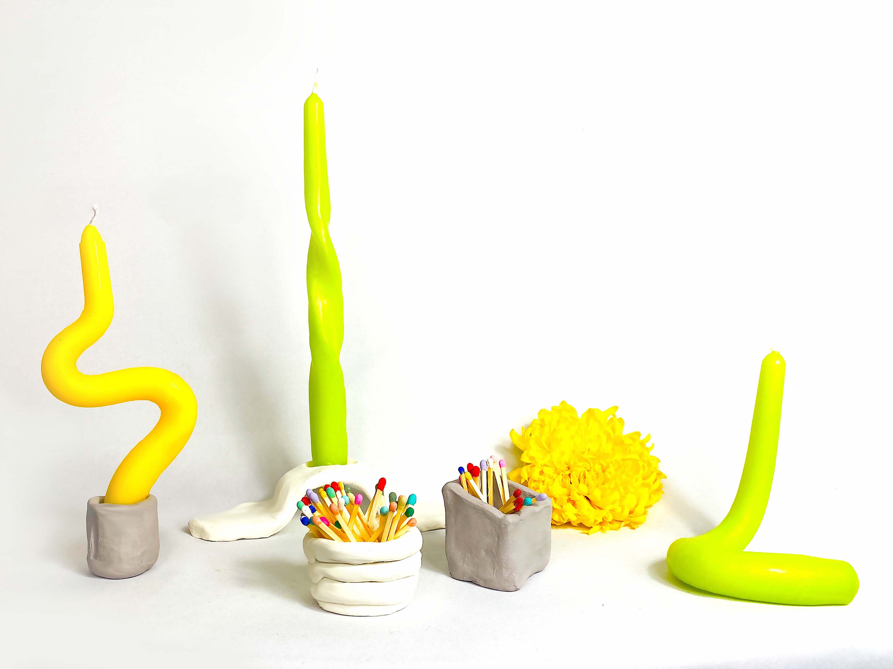 Colorful candles and matches on a table