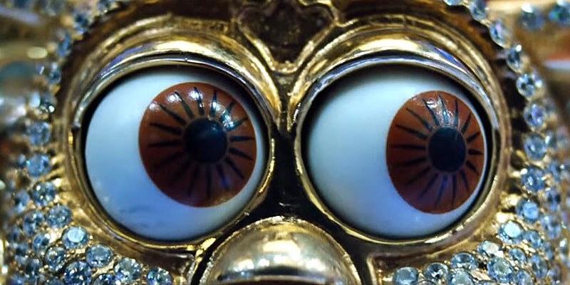 Gold Furby eyes encrusted with diamonds