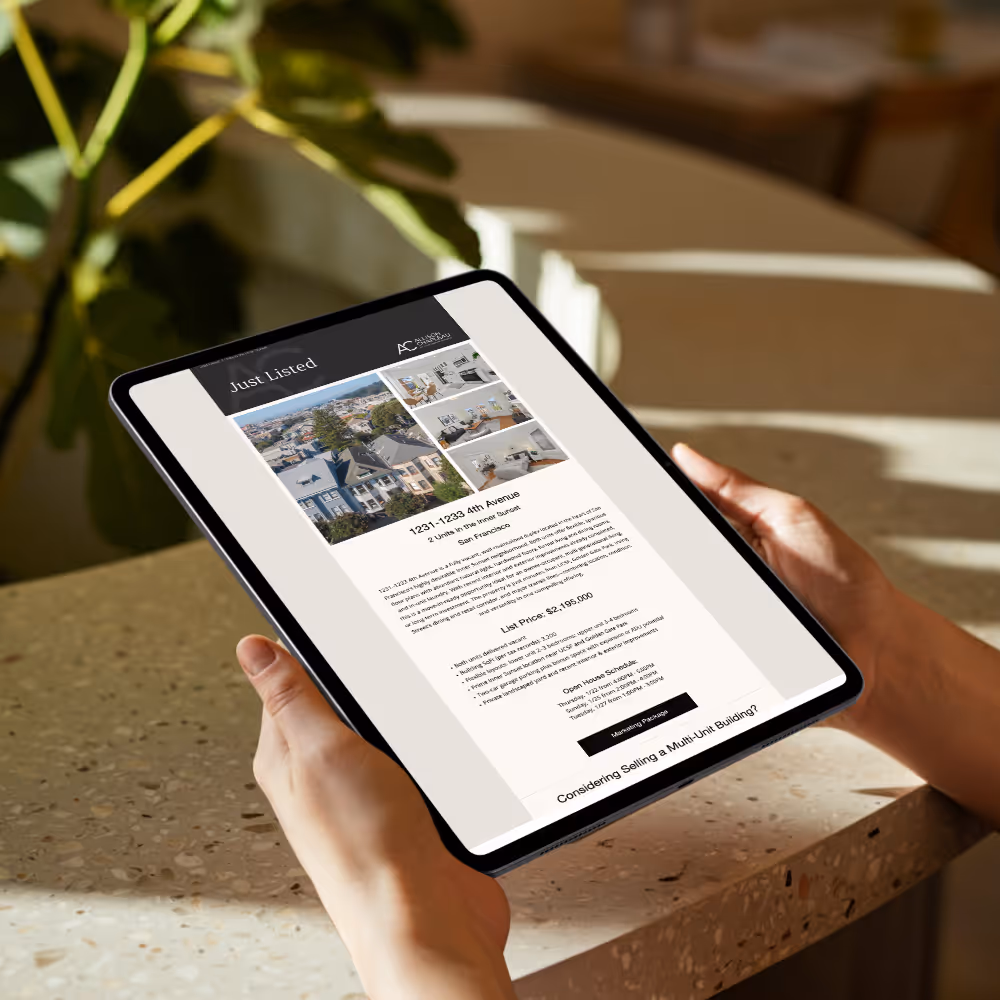 Person holding a tablet displaying a real estate listing for 1231-1233 4th Avenue in San Francisco.