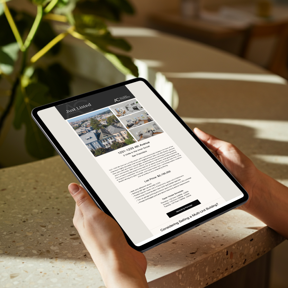 Person holding a tablet displaying a real estate listing for 1231-1233 4th Avenue in San Francisco.