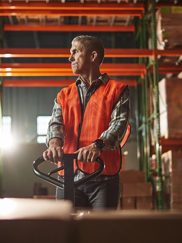 a temp worker moving materials for a construction company