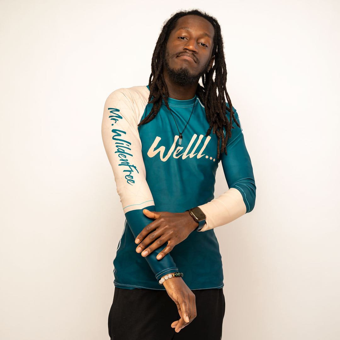 Wildenfree Teal Rashguard, Right side, with "Mr. Wildenfree" down the right arm 