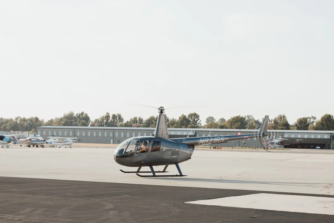 Helicopter on the Fullerton Airport tarmac during a Hangar 21 corporate event