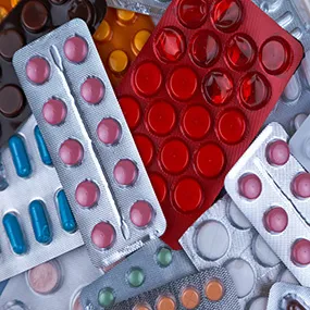 A pile of pills and contraptions sitting on top of each other.