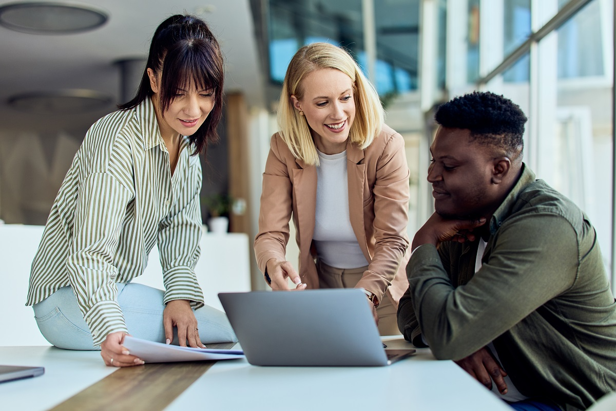 Founders and advisors organizing startup data room documents together to prepare for investor review and due diligence