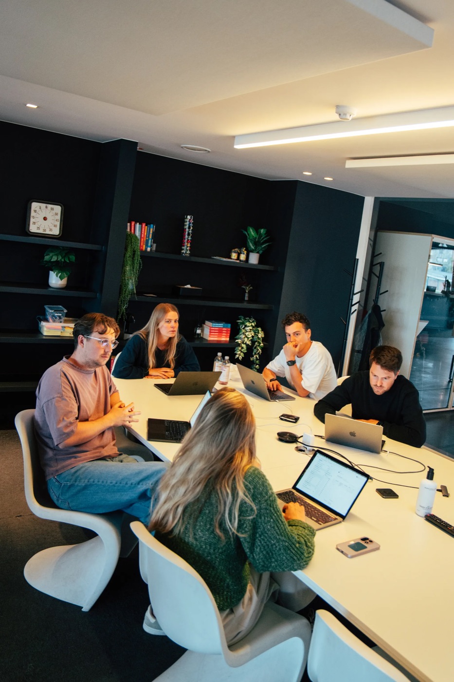 The Nimble team in a meeting around a table