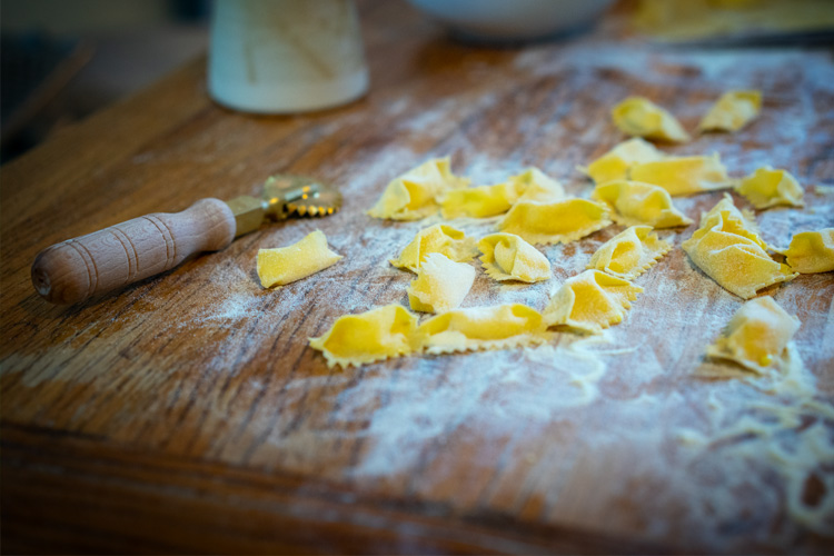 plating agnolotti / semola / guanciale / pecorino