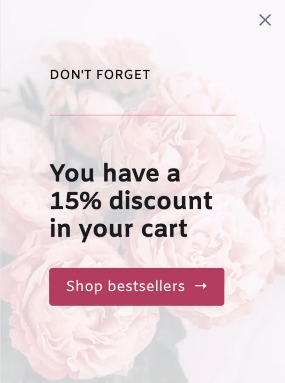 A popup for returning subscribers who haven't purchased yet that reads, "Don't forget. You have a 15% discount in your cart."
