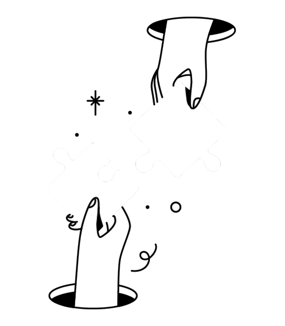 Two hands connecting puzzle pieces together