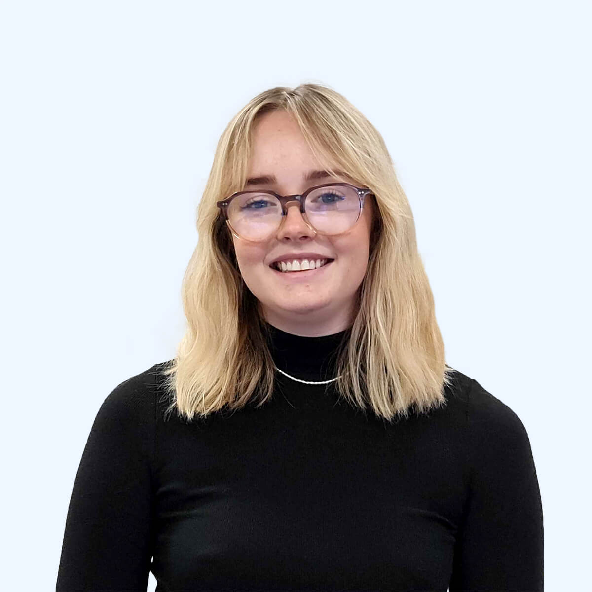 A headshot of an employee from Chaos Theory Games.