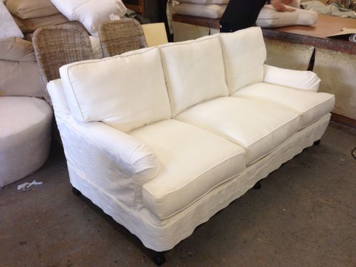 Sofa before custom slipcover by Manilla Upholstery