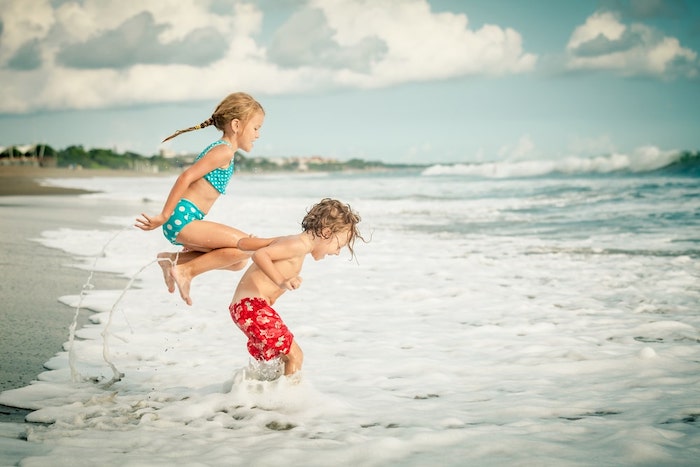 Students from diverse backgrounds collaborating in a modern classroom setting