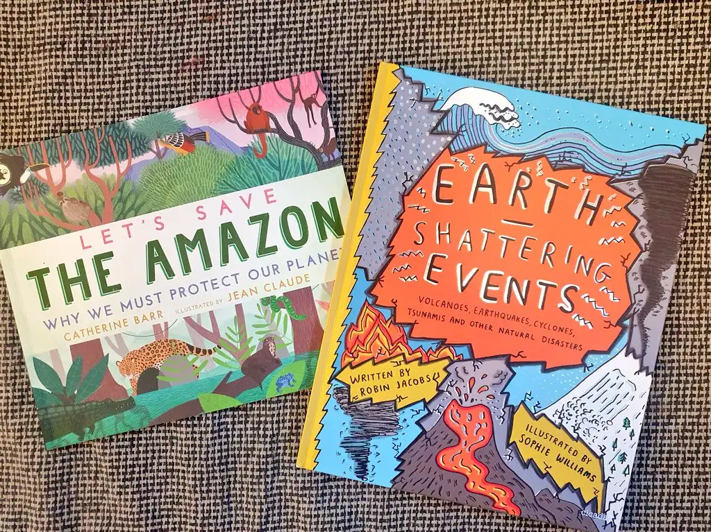 Two published geography books shown on patterned fabric in the original post. No age recommendation is implied.