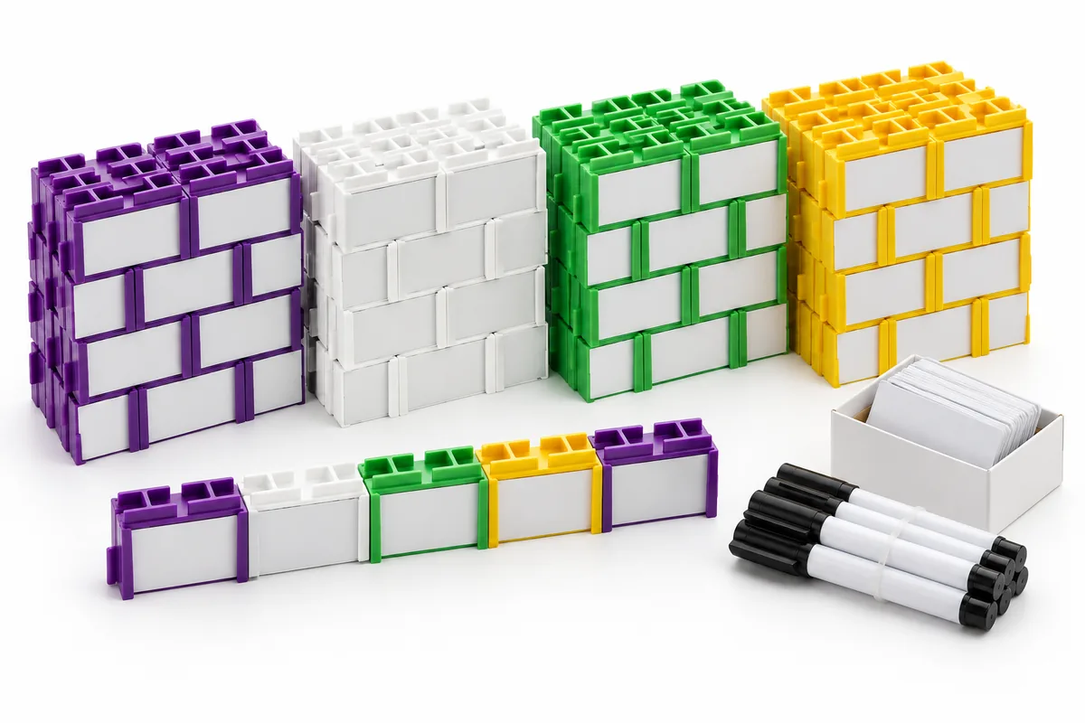 Illustration: one Writer's Block kit, about a hundred blocks in purple, white, green and yellow stacks, a short row of five blocks, a small box of mini whiteboards and a bundle of dry-wipe pens