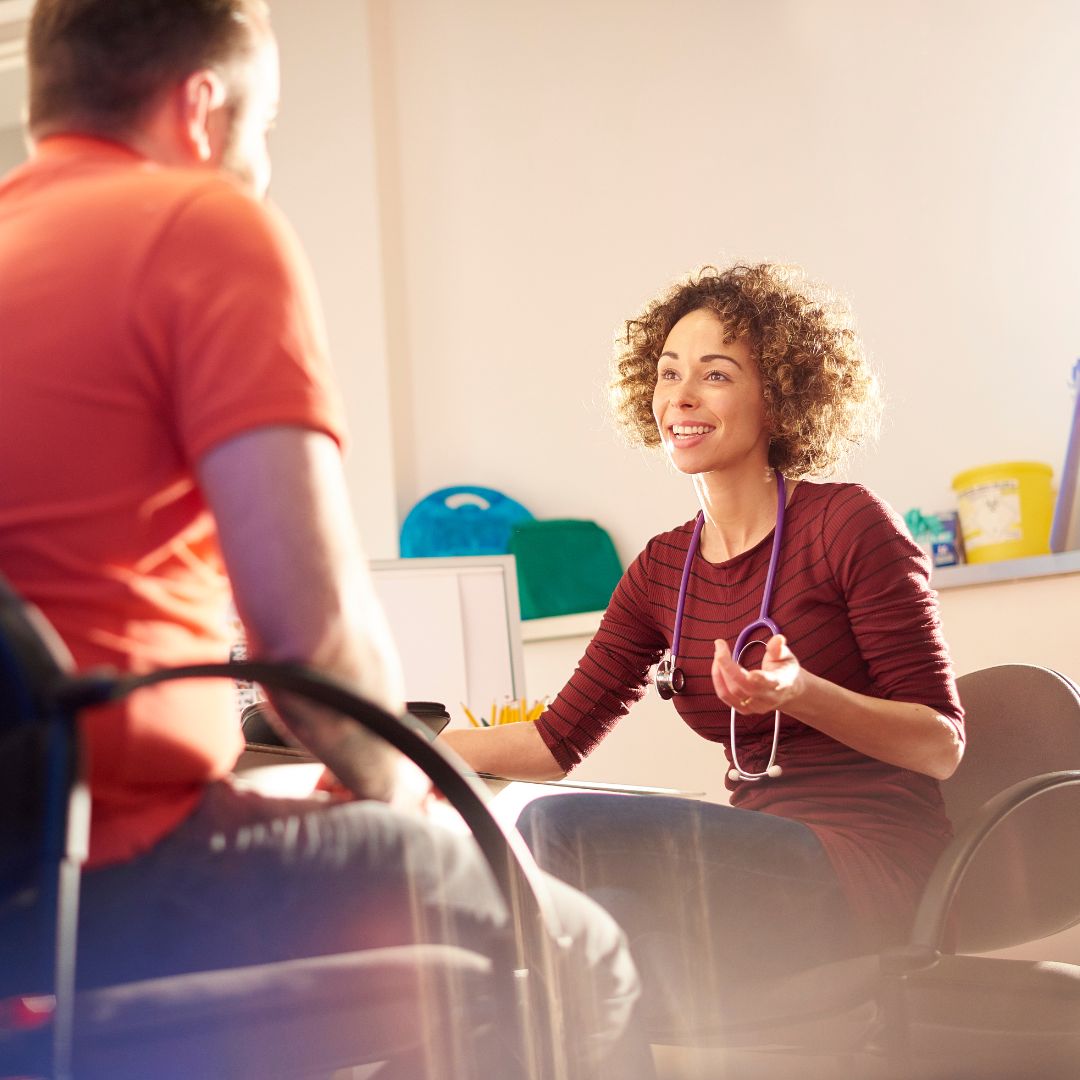 A doctor talking to a patient
