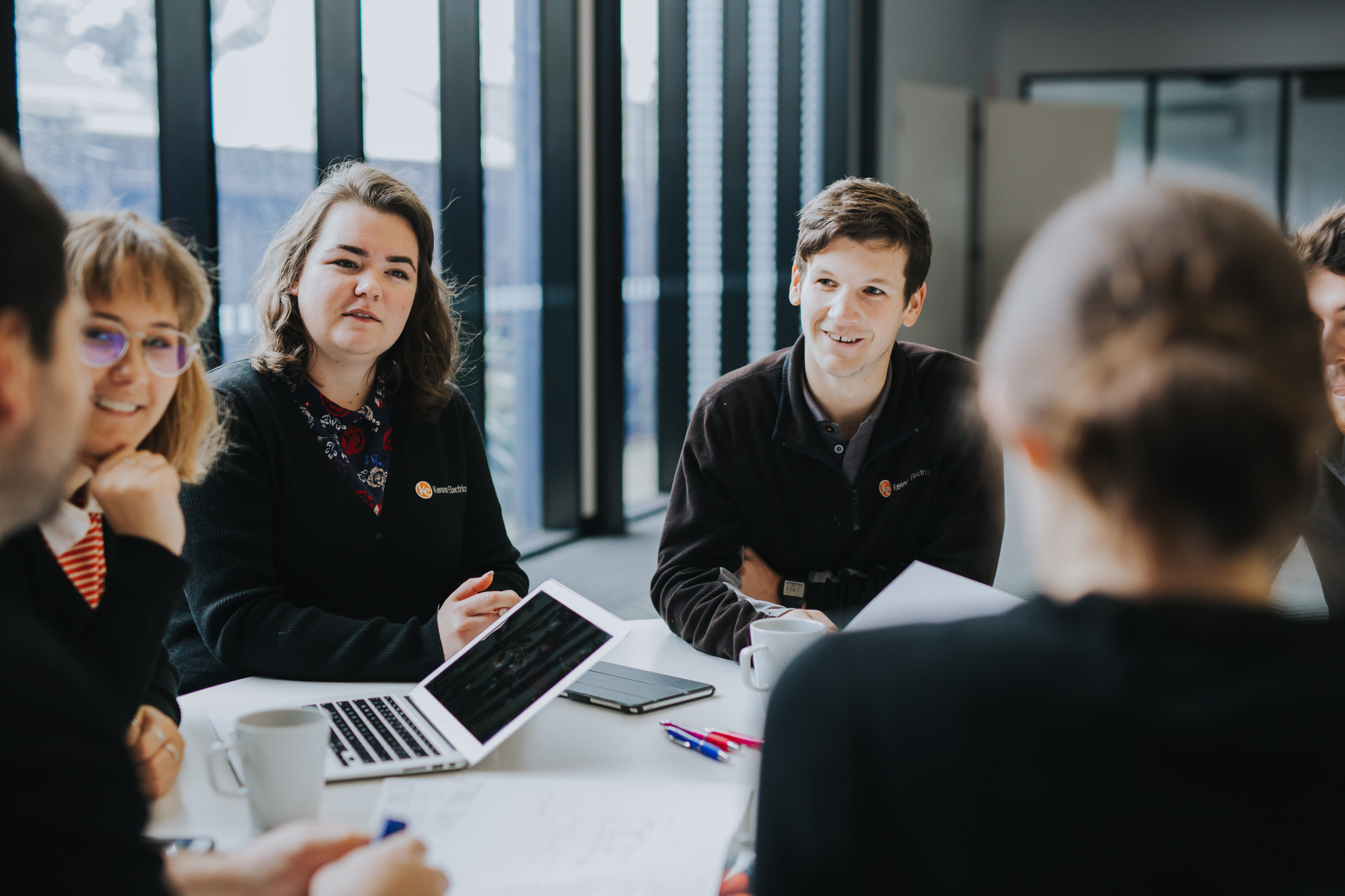 Kenner Electrics team job debrief at the weekly meeting