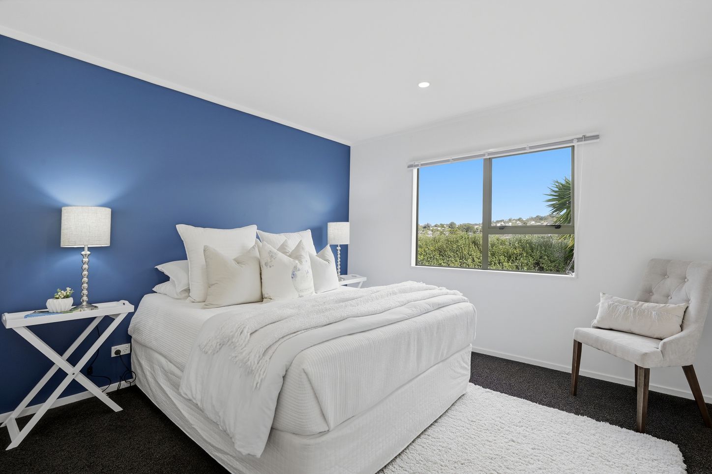 Knott Road, Stanmore Bay - master bedroom with blue accent wall